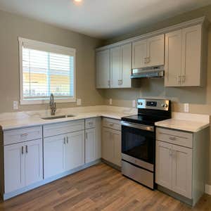 Photos by Dwelling Lab #1 Single-family Home to Triplex Conversion