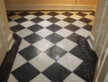 Marble Restoration Game room and hallway marble floors, Honed and re-polished.