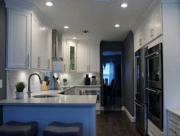 Photos by Cascella & Sons Construction Corp #3 Complete Renovation of Kitchen - New White Shaker Style Cabinetry, Porcelain Plank Flooring, Stainless S