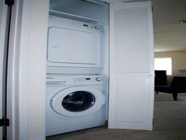 Eco Remodel Bath Remodel and Laundry Closet Addition Our client had a great vision for her newly purchased home, including added indoor laundry and a m