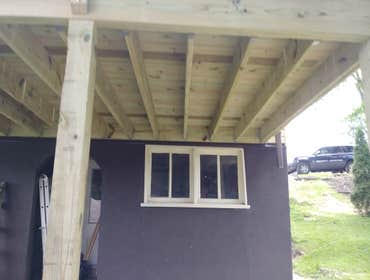 Photos by Canady Construction & Home Improvement #1 10x20 Deck with sliding glass door addition