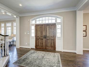 GULICK | CUSTOM Home in McLean The impressive stone and HardiePlank® elevation on our Winthrop really stood out on this corner lot of approximately one