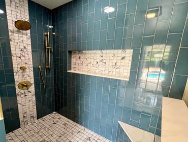 Tiling Work Transforming bathrooms, one tile at a time! ? Loving the fresh look of our latest shower remodel featuring sleek blue Subway tiles. Clean l