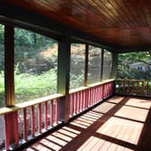 Photos by Lyman Design LLC #1 Restoration of rotted stairways and deck boards, including all new paint and stain.