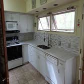 Quartz top, glass back splash