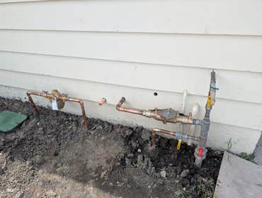 water lines. A pressure regulator and 2 backflow preventer