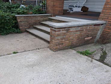 Photos by Blue Stone Landscaping LLC #18 Steps repair: remove brick walls,add concrete footings and build them back with concrete blocks and paint them