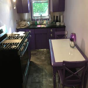 Photos by Steve Burnsed General Contracting #4 Remodeled Kitchen included sanding and painting metal cabinets ,installing new fan,lights floor and...