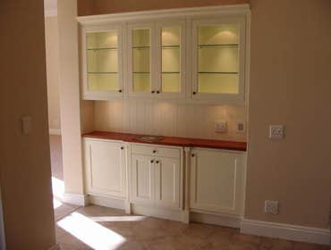 LAM Woodworks Here are some pictures of work done using different materials, from stained Mahogany to solid Bubinga or Beech, from Maple to Poplar for