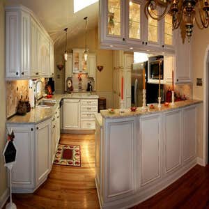 Project photos from Munz Construction, Inc. Custom door into basement media room