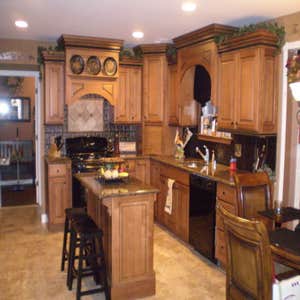 Kitchen This kitchen has some very nice details along with the archways and columns we installed to seperate the two rooms. We also installed the...
