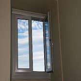 Energy Efficient Window Replacement Replaced old windows with energy efficient windows for an upscale residential property.