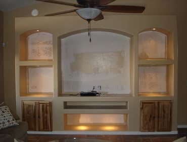 Photos from Love Remodeling Llc Built in custom entertainment center and custom oak floating shelves