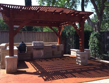 Outdoor Kitchen Stoned Posts Stained Concrete