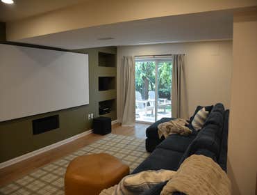 Photos by Ameripro Remodeling, LLC #15 Finishing basement project. Full bathroom, Cinema rec room, dry bar, utility room.