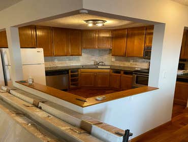 Photos by Infinite Floors & More #4 Full kitchen remodel. New cabinets, lighting, appliances, flooring throughout entire condo, new trim!