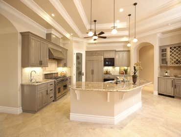 Luxury Kitchen We wanted to create a luxury kitchen that was still inviting. We installed marble flooring, custom cabinetry, granite counter-tops, hig