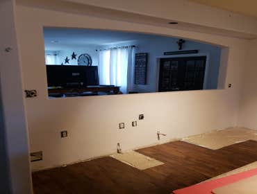 Archway Remove cabinets and appliances. Cut an opening in the wall and create an archway.