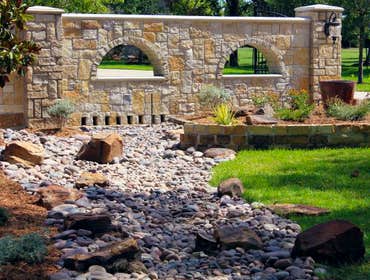 River Bed Stone Wall Entry