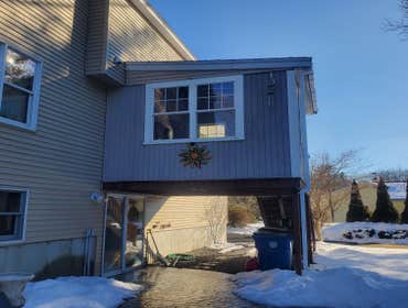 Photos by Triple Infinity LLC #5 Build open deck extension 18x12, 6x6 post and footings—composite decking and handrails.