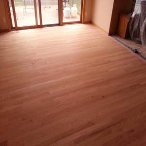 Rossell Custom Wood Floors Project Sanding and refinishing of a dinette.