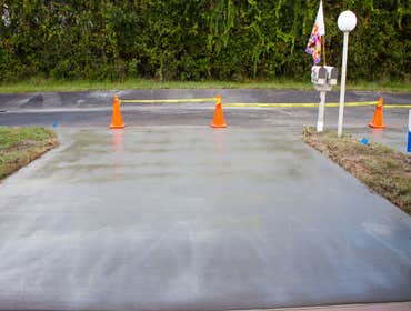 Jhm Construction Llc Project Drive Replacement - Before and After. JHM also applied a curing compound to help maximize the concrete strength for greate