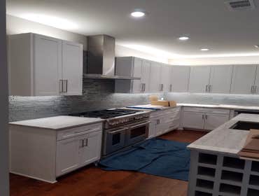 Mesquite full kitchen remodel We knocked down a non supporting wall that divided kitchen from living room and make it into one big kitchen. In the isla