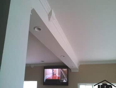 Custom Ceiling Job Description: Crown molding installation, light fixtures added, drop down ceiling design.