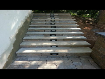 Outside work pavers, addition and siding. Photos of outside work. Back yard pavers