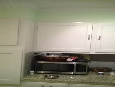 whole house remodel Kitchen remodel, resurfaced cabinets, tile backsplash, new vinyl plank flooring (click together), new custom toe kicks, transition 
