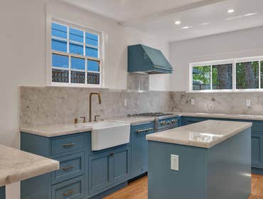 Kitchen Remodel | Menlo Park, CA This stunning kitchen remodel blends timeless elegance with modern functionality. Custom blue cabinetry creates a bold