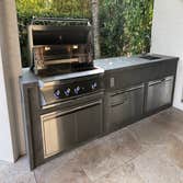 Photos by Woodpeckers Solutions Llc #2 10' BBQ Island, Twing Eagles 42" BBQ, Twin eagles access doors, ITOPKER storm negro countertops, electrical and 