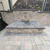 Photos by Reliable Landscaping & Design LLC #1 Full front yard renovation, Water feature , installation on Calstone Mission pavers , Installation of Ro