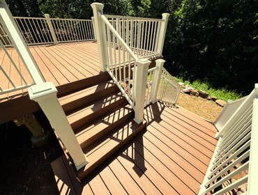 Deck Build - Rockaway, NJ This deck was barely hanging on when we showed up—loose railings, rotting boards, and water damage where it met the house. We
