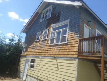 Photos by Show Quality LLC #5 We do siding replacement and install. Hardie board on the bottom, Cedar shake up above.