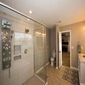 Photos by Edgewater Construction LLC #3 Design/Build - Complete remodel of Master Bathroom with addition of a walk-in closet, demolition of existing be