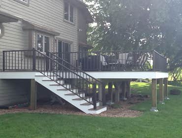 Photos by Custom Home Specialties Inc #2 Timber Tech maintenance free decks with powder coated railings.