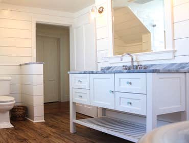 Baine Contracting Inc Project Multiple jobsites - showing kitchens, interior and exterior trim work, new homes, bathrooms, tile work, wood and iron ra