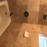 Custom stone tile bath walls