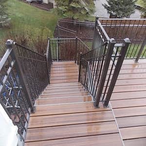 Deck/ Eden Prairie Bear Path GEM ! PVC Decking wrapped with accent boarder to mach homes exterior. Custom made Handrail to match style and color...