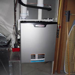 American Standard installation residential This is a recent installation of an American Standard heating and cooling system in a residential setting.