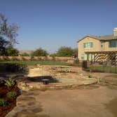 Photos from Dandy Landscape Construction flagstone walkway, patio cover, pool, hardscape, landscaping. Low voltage lighting.