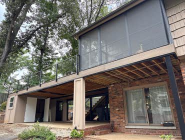 Outdoor Spaces Create a modern carport with composite deck and wire railing.