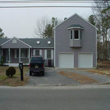 addition Two Car garage addition including living space upstairs, roofing and siding