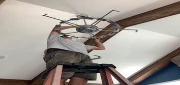 Fan Install- Modern New Construction Homes Installation of a non-standard fan in a new construction home. Installation of light fixtures.