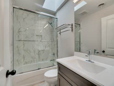 The Potomac River Renovation This modern and luxury home renovation shines with an expansive kitchen, that includes a wolf range, all fridge/freezer, a