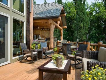 Retreat at Flathead Lake This award winning 5550sf home with 2 guest cabins and a two slip dock on beautiful Flathead Lake in Northwest Montana was des