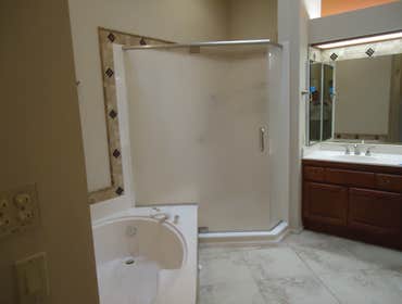 Project photos from Cadillac Tile Company L L C Here we have a good example of before[left side] and after photos, This is just a very small sample of 