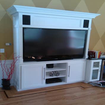 Custom Cabinetry Here is an example of how we took a home entertainment system and built it into a custom cabinet to take it to the next level.