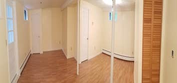 Photos by Lyman Design LLC #2 Complete renovation of basement from water damage.